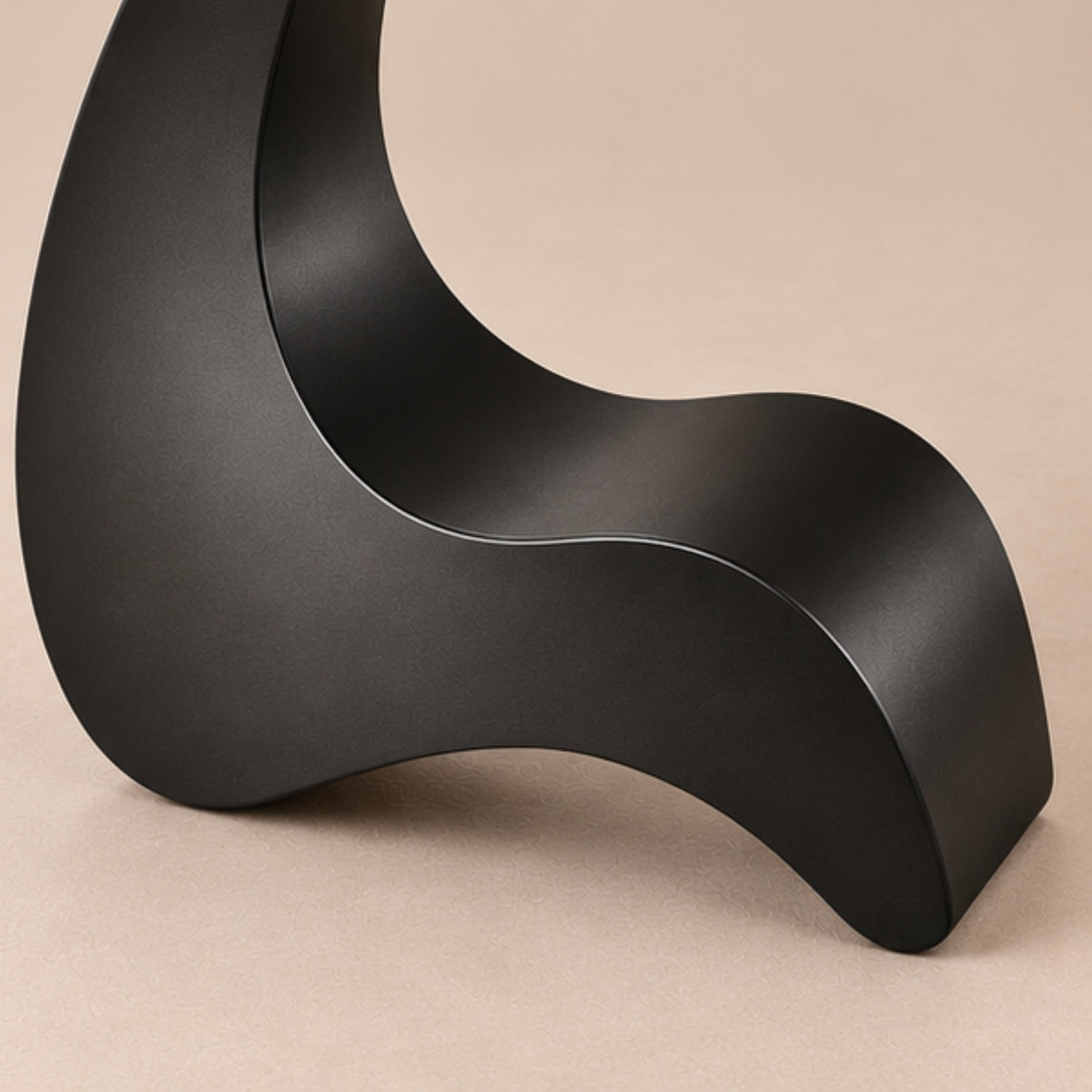SCULPTURAL BLACK CURVED SIDE TABLE
